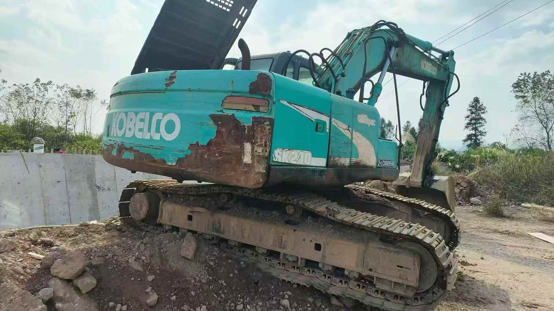 Buy Kobelco SK210 Used Excavator / 1